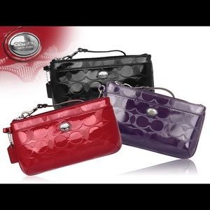 Red Embossed Coach Wristlet